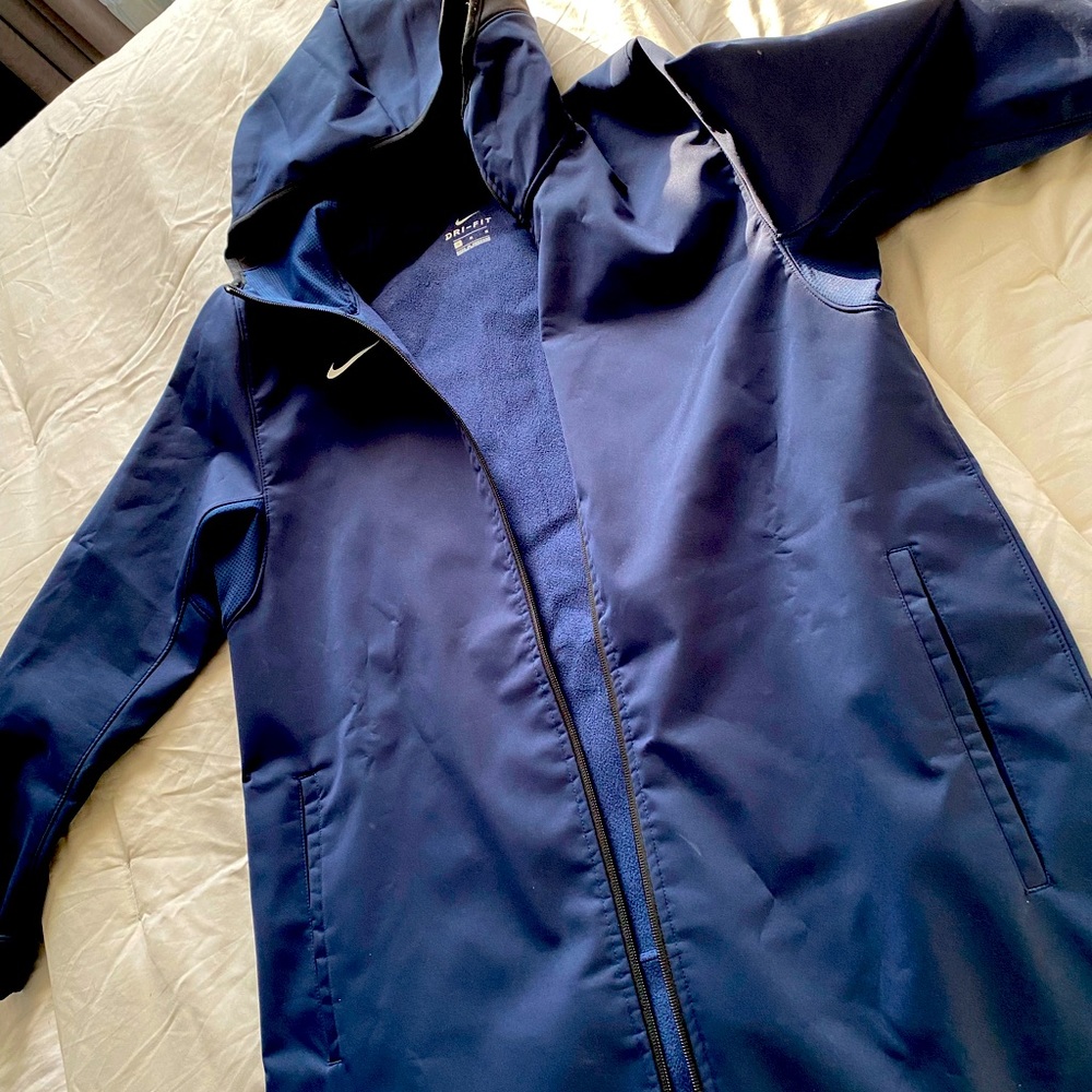 Gently used Nike performance rain jacket/ dark navy/ medium but runs large